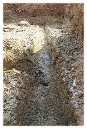 Ground water flowing into footing excavation