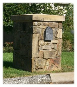 A custom rural stone mailbox