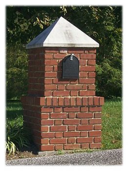 A custom red brick mailbox