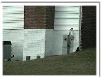 Chimney on top of poured concrete foundation