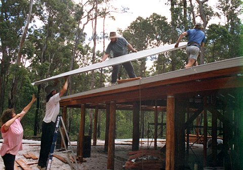 All hands on deck for the metal roofing...