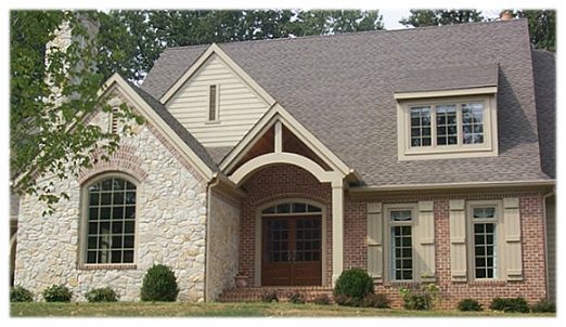 Brick and stone custom home close up of front entrance