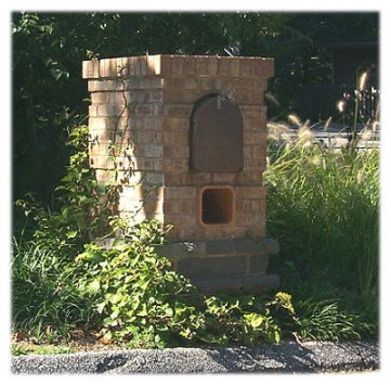 A custom brown brick mailbox